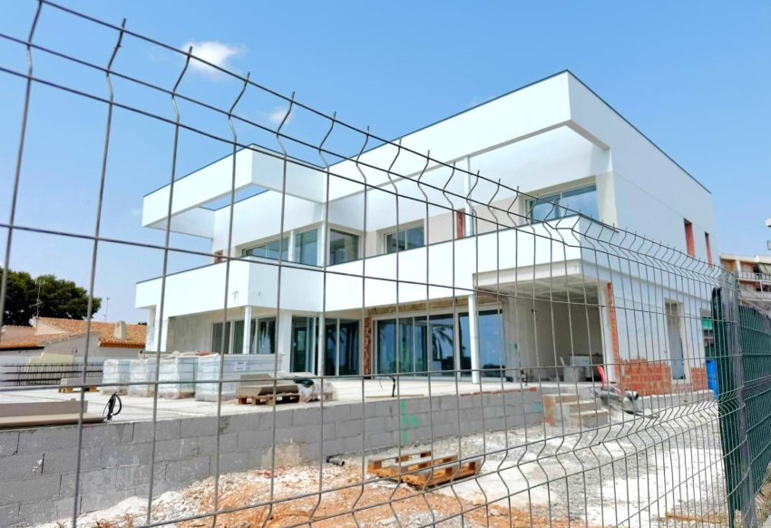 Obra nueva - Villa -
Orihuela Costa - Punta Prima