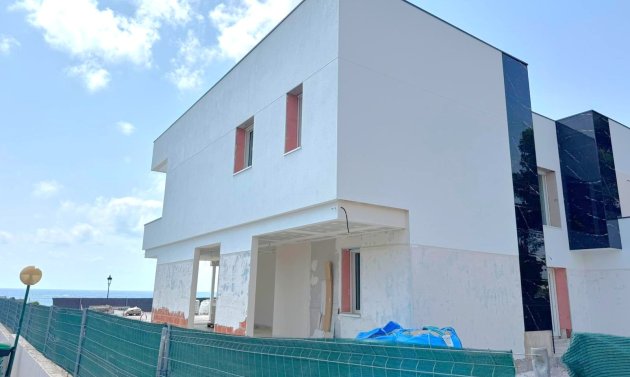 Obra nueva - Villa -
Orihuela Costa - Punta Prima