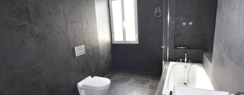 Bathroom with black wall tiles 2
